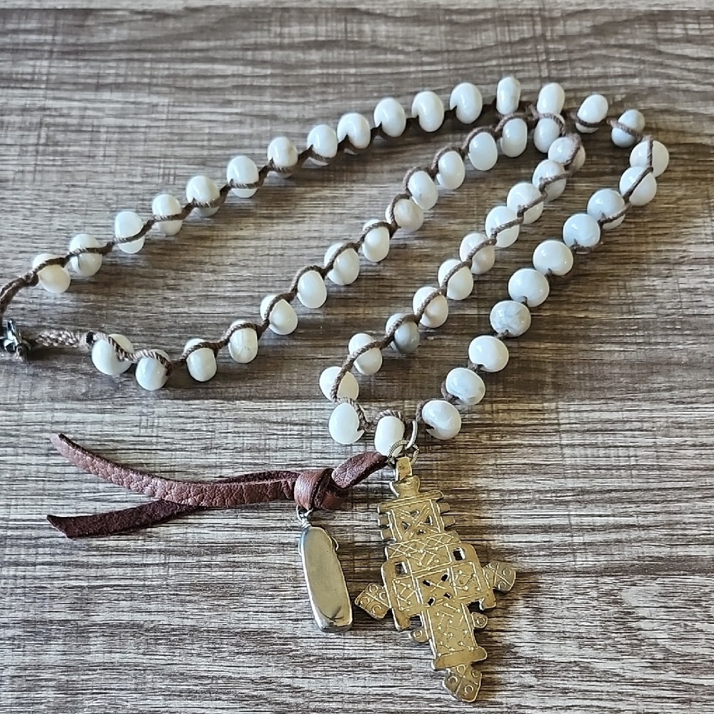 White Beaded Necklace with Silver Pendant